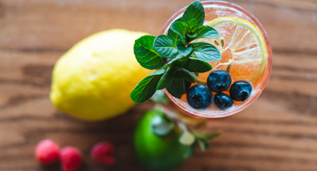 Aerial View of Icy Drink with Blueberries, Lemon, and Mint