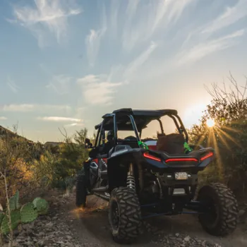 ATV Drives Through Arizona Sunset