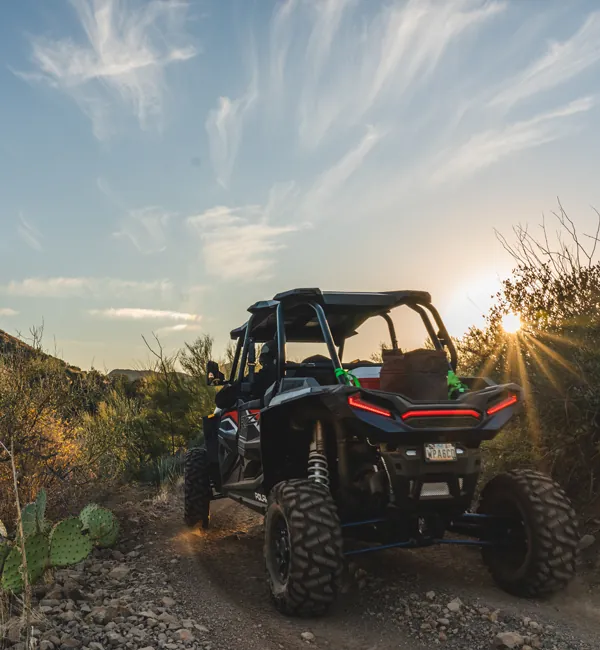 ATV Drives Through Arizona Sunset