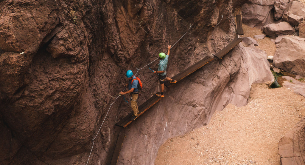 People climbing the Via Feratta