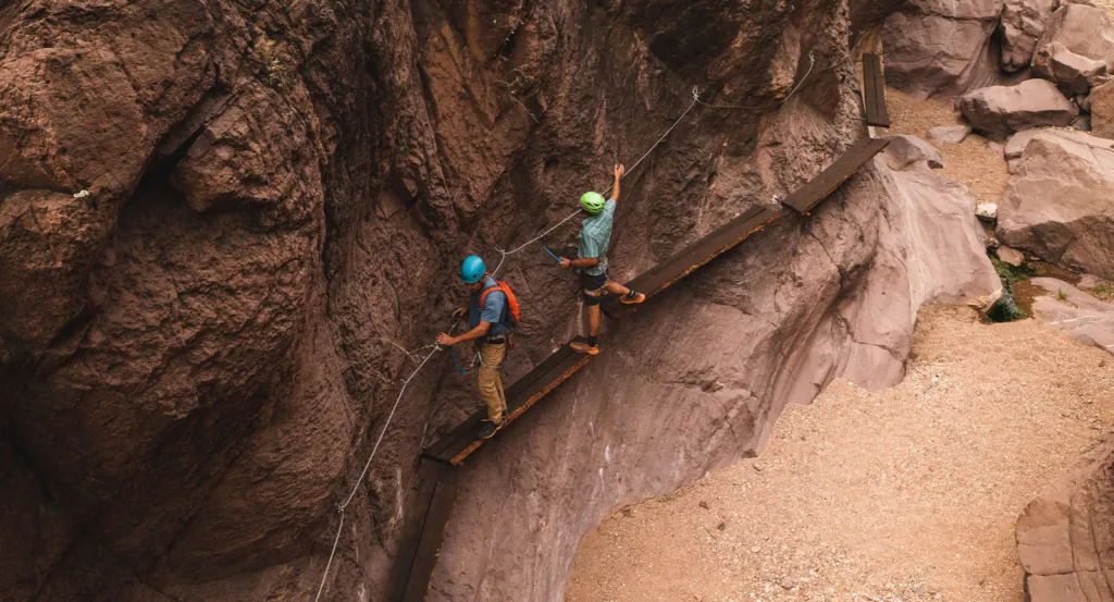 People climbing the Via Feratta
