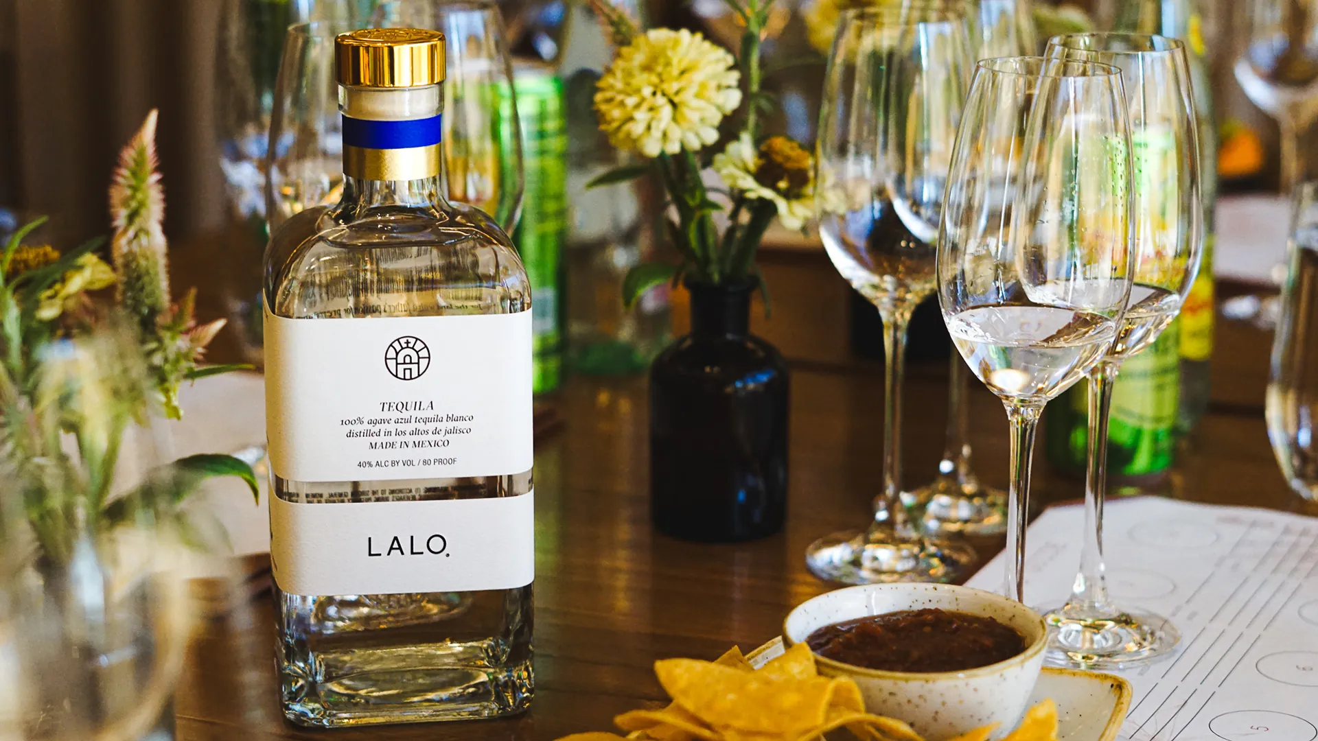 Agave Tasting Class with glassware and bottles.