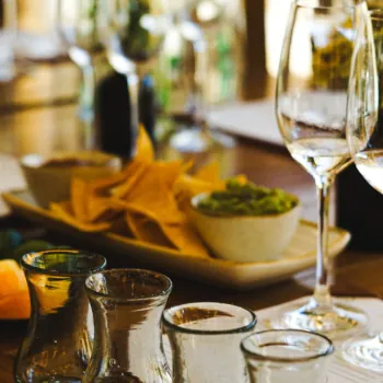 Agave Tasting Class with glassware and bottles.