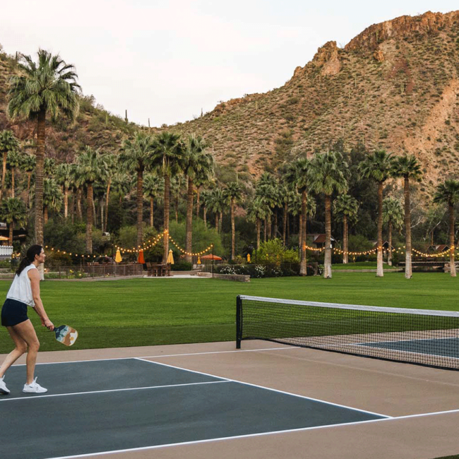 A couple playing pickleball in Arizona