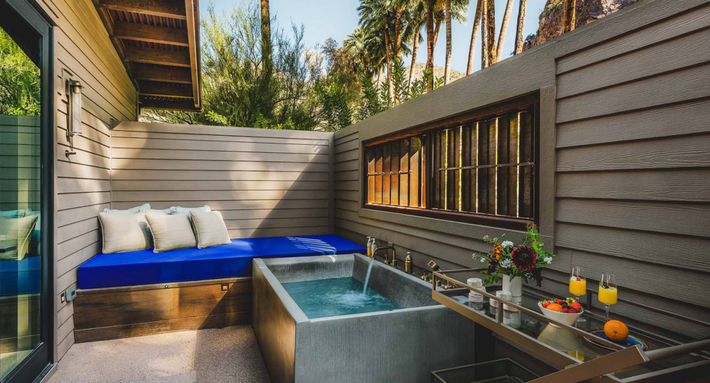 Private outdoor soaking tub and lounger in a Spring Bungalow, unique getaways in Arizona.