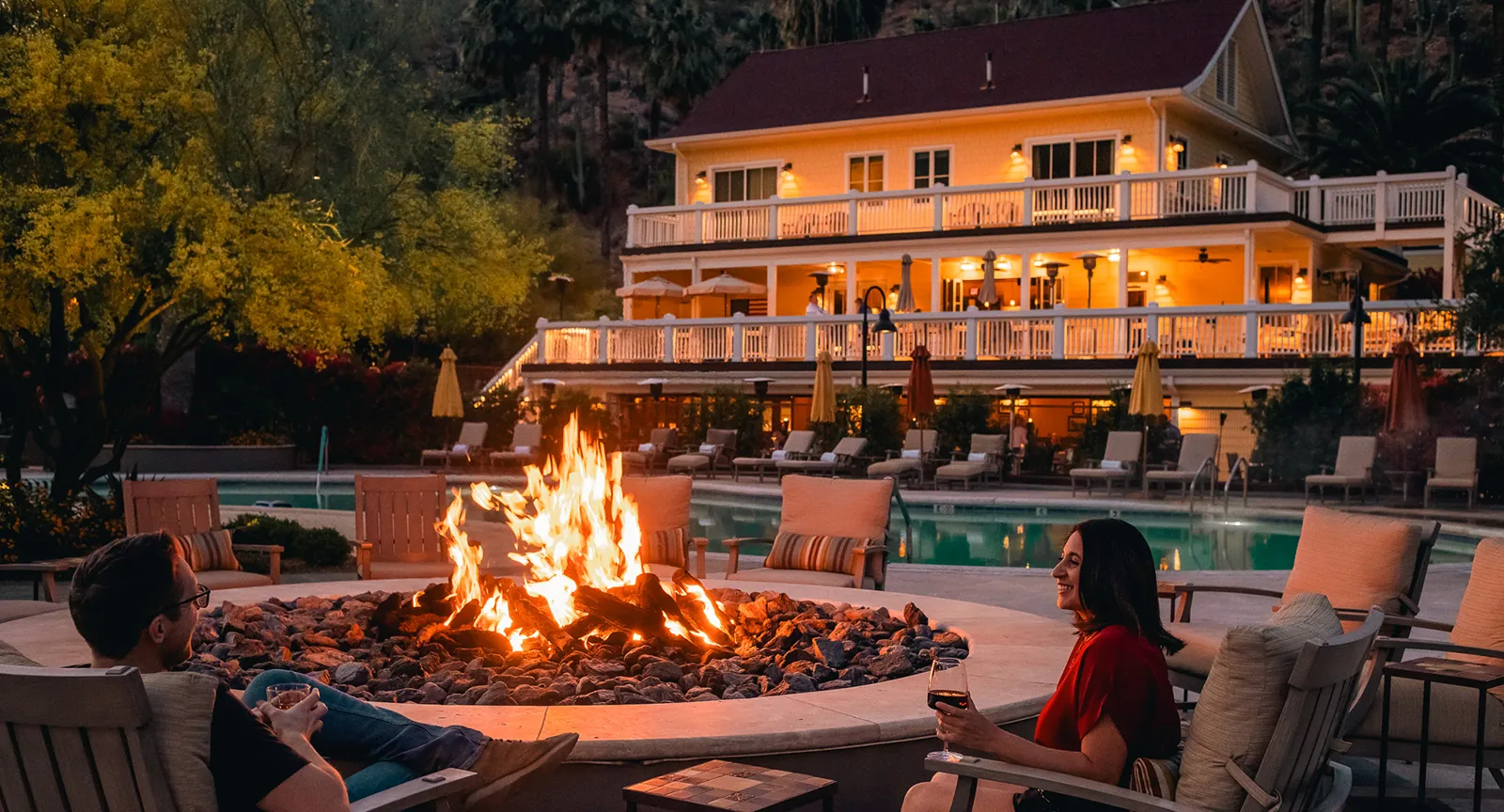 Drinking wine around a firepit at one of the best family resorts in Arizona.